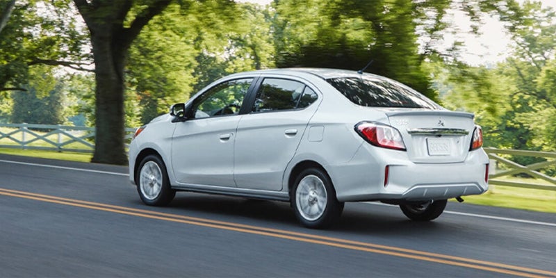 A White Mirage running on road